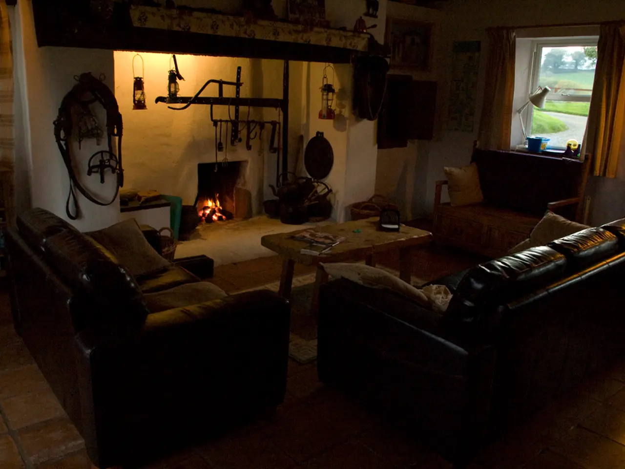 there is a room in which there is a sofa. in the center there is a table. at the right there is a...